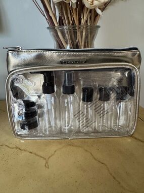 BEBE Travel Toiletry Bag with Refillable Bottles and Labels. New